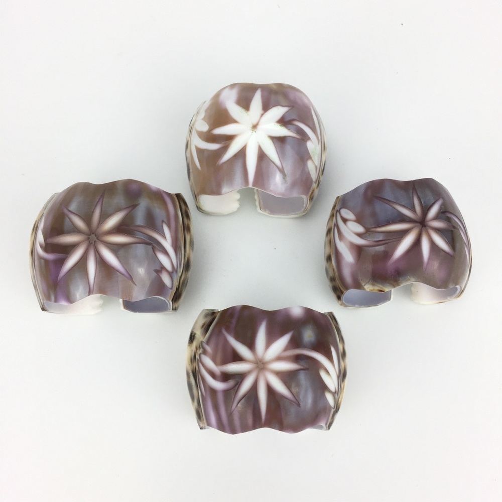 Carved tiger cowrie seashell napkin rings set 4